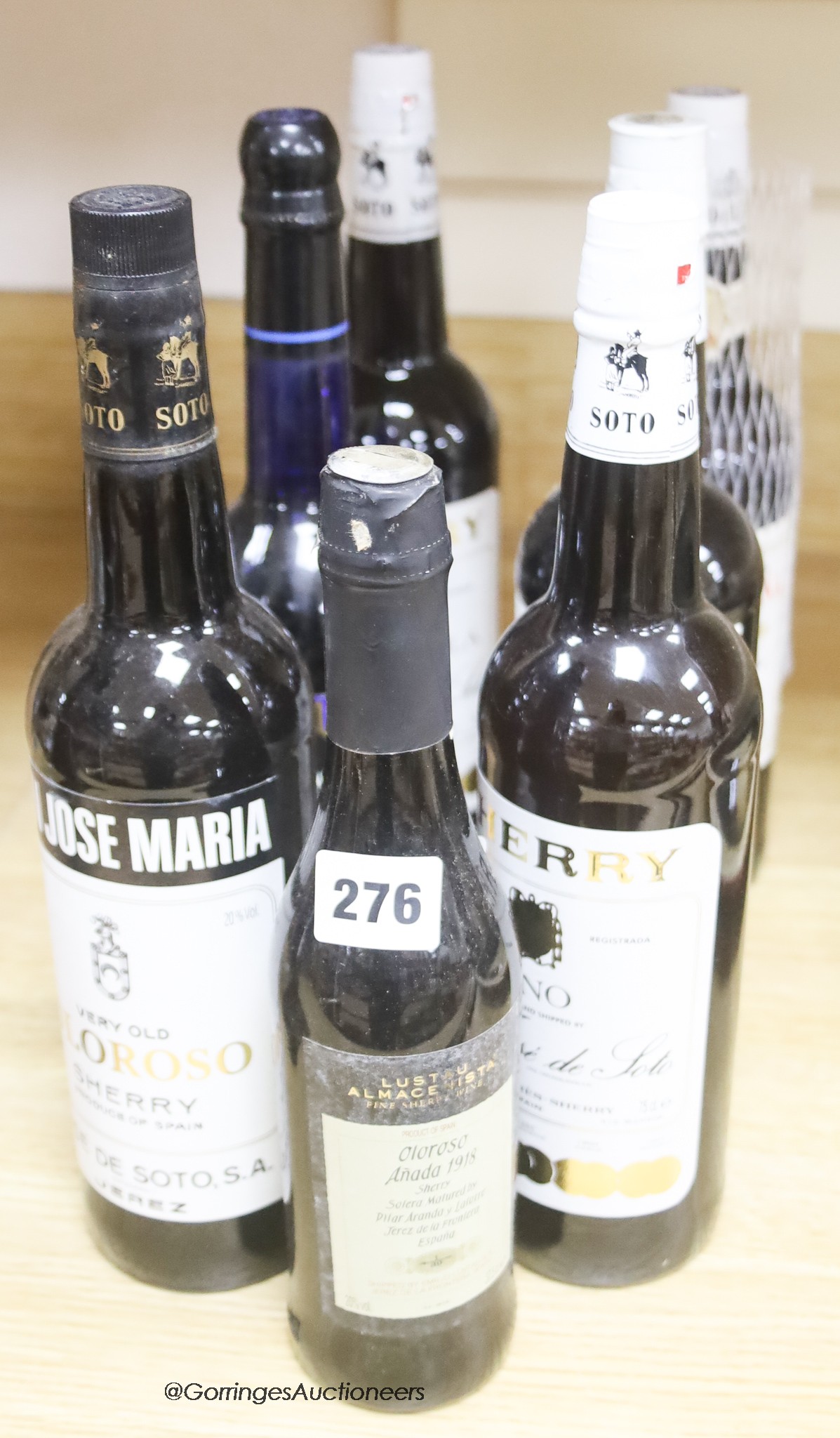 Six assorted sherries including Don Jose Maria Very Old Oloroso, Amontillado, Manzanilla etc. and one half bottle.